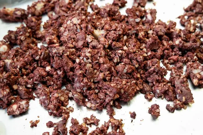 Mansuet Troicher ist Meister des Blutwurstmachens