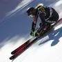 Canada's Valerie Grenier speeds down the course during an alpine ski, women's World Cup super G race, in Cortina d'Ampezzo, Italy, Sunday, Jan. 28, 2024. (AP Photo/Gabriele Facciotti)