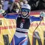 France's Romane Miradoli reacts as she crosses the finish line of an alpine ski, women's World Cup super-G, in Lenzerheide, Switzerland, Saturday, March 5, 2022. (AP Photo/Giovanni Auletta)