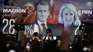 Ma­cron und Le Pen lie­fern sich am 24. April das Duell um die Präsidentschaft.