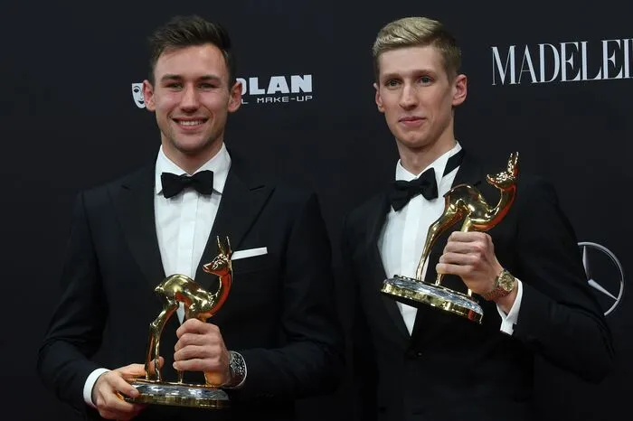 Die Sportler Niklas Kaul (L) und Florian Wellbrock