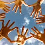 Friendsship team concept with many hands in circle