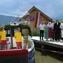 Ein Boot mit Menschen am Millstätter See