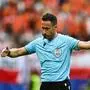 Portuguese referee Artur Soares Dias blows the whistle during the UEFA Euro 2024 Group D football match between Poland and the Netherlands at the Volksparkstadion in Hamburg on June 16, 2024. (Photo by GABRIEL BOUYS / AFP)