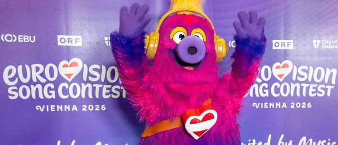 Pink und lila: Maskottchen Auri ist auch ein Kinderbuch gewidmet