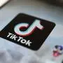 FILE - This Monday, Sept. 28, 2020, file photo, shows the TikTok logo on a smartphone in Tokyo. On Sunday, March 6, 2022, Netflix and TikTok suspended most of their services in Russia as the government cracks down on what people and media outlets can say about Russia's war in Ukraine. (AP Photo/Kiichiro Sato, File)