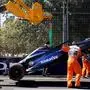Marshals remove Williams' Thai driver Alexander Albon crashed car from the circuit during the first practice session of the Formula One Australian Grand Prix at the Albert Park Circuit in Melbourne on March 22, 2024. (Photo by Martin KEEP / AFP) / -- IMAGE RESTRICTED TO EDITORIAL USE - STRICTLY NO COMMERCIAL USE --