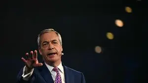 Reform UK Leader Nigel Farage speaks to attendees during the political party Reform UK's Local Election Campaign Launch, in Birmingham, central England, on March 28, 2025. (Photo by Oli SCARFF / AFP)