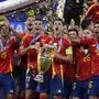 Spain's Alvaro Morata holds the trophy as he celebrates with his teammates after winning the final match between Spain and England at the Euro 2024 soccer tournament in Berlin, Germany, Sunday, July 14, 2024. Spain won 2-1. (AP Photo/Frank Augstein)