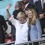 British Premier Boris Johnson waves from the stands prior to the Euro 2020 soccer championship semifinal match between England and Denmark at Wembley stadium in London, Wednesday, July 7, 2021. (AP Photo/Carl Recine, Pool)