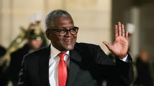 Nigerian multinational industrial conglomerate Dangote Group's CEO Aliko Dangote arrives for a dinner in honour of the President of Nigeria, at the Elysee palace in Paris, on November 28, 2024. (Photo by Thomas SAMSON / AFP)