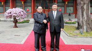 Kim Jong-un bei Xi Jinping 