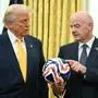 FIFA president (Fédération Internationale de Football Association) Gianni Infantino presents US President Donald Trump with the new FIFA Club World Cup official ball in the Oval office of the White House, in Washington, DC, on March 7, 2025. (Photo by Jim WATSON / AFP)