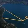 An aerial view of the installation 'The Floating Piers' by Bulgarian-born artist Christo Vladimirov Yavachev known as Christo, on the Lake Iseo, northern Italy, Saturday, June 18, 2016. Some 200,000 floating cubes create a 3-kilometers runway clad in bright yellow fabric and connecting the town of Sulzano to the small island of Monte Isola on the Iseo Lake for a 16-day outdoor installation opening on June 18 through July 3. (Filippo Venezia/Ansa via AP)