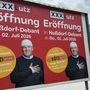 Eine Plakatwand in Lienz mit der Ankündigung der XXXLutz-Eröffnung samt Konzert von DJ Ötzi
