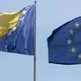 (FILES) In this file photo taken on August 13, 2018, the national flag of Bosnia and Herzegovina (L) is pictured next to the European Union flag during a welcoming ceremony for Bosnia's Chairman of the Council of Ministers, at the Chancellery in Berlin. - EU countries agreed December 13, 2022, to grant Bosnia "candidate status" to join the union, diplomats told AFP, putting the volatile Balkan nation at the start of a long road to membership. European affairs ministers meeting in Brussels gave the green light to the move after the bloc's executive arm in October recommended that they launch the membership process. (Photo by Adam BERRY / AFP)