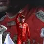 Winner Ferrari's Monegasque driver Charles Leclerc (C) celebrates next to second placed Mercedes' Finnish driver Valtteri Bottas (L) and third placed Mercedes' British driver Lewis Hamilton (R) on the podium after the Italian Formula One Grand Prix at the Autodromo Nazionale circuit in Monza on September 8, 2019. (Photo by Miguel MEDINA / AFP)