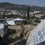 UNHCR  tents are staged at a makeshift part of the the Samos refugee camp, built for 650, housing now nearly 4,000 people just above the city of Vathy on June 18, 2019. - With nearly 9,000 arrivals since the beginning of this year, the situation on the islands is explosive -- especially on Lesbos and Samos -- and the ministry of migration is desperate to remove as many people from the camps as possible. (Photo by LOUISA GOULIAMAKI / AFP)