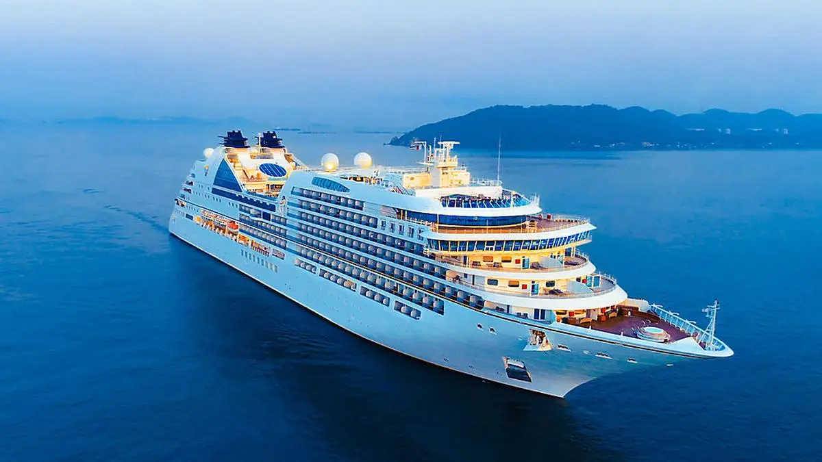 Aerial view of beautiful white cruise ship above luxury cruise in the ocean sea at early in the morning time concept tourism travel on holiday take a vacation time on summer.