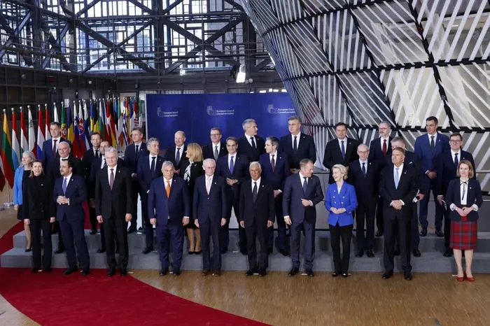 European Union leaders pose for a group photo, as they celebrate 50 years of the European Council, at an EU summit in Brussels, Thursday, Dec. 19, 2024. (AP Photo/Omar Havana)