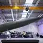 An ATACMS rocket is on display at Rheinmetall's new artillery plant in Unterluess, northern Germany on August 27, 2025. German weapons-maker Rheinmetall opened Europe's largest munitions plant on August 27 as Berlin rushes to rearm after decades of running down its military. Taking up 30,000 square metres -- the size of five football pitches -- the factory in Unterluess in northern Germany will be able to produce 350,000 artillery shells a year by 2027. (Photo by Ronny HARTMANN / AFP)