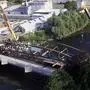 Am 26. Juni 2001 wurde die alte Wirtschaftsbrücke abgebaut und auf einem Grundstück im Osten der Stadt zwischengelagert