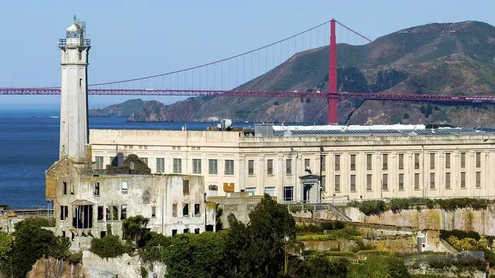 The Golden Gate Bridge stands behind Alcatraz Island on Monday, May 5, 2025, in San Francisco. (AP Photo/Noah Berger)