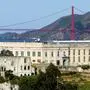 The Golden Gate Bridge stands behind Alcatraz Island on Monday, May 5, 2025, in San Francisco. (AP Photo/Noah Berger)