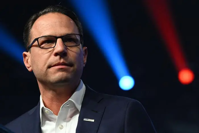 (FILES) Democratic gubernatorial candidate for Pennsylvania Josh Shapiro looks on during a rally ahead of the US midterm elections, in Philadelphia, Pennsylvania, on November 5, 2022. US President Joe Biden announced July 21, 2024 that he is dropping out of his reelection battle with Donald Trump, in a historic move that plunges the already turbulent 2024 White House race into uncharted territory. Biden's withdrawal from the race for the White House leaves a gap atop the Democratic presidential ticket that the party. (Photo by SAUL LOEB / AFP)