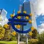 Frankfurt am Main, Germany - October 2, 2016 - The huge sculpture of the Euro sign in front of the European Central Bank headquarter building in Franfurt am Main, Hesse, Germany