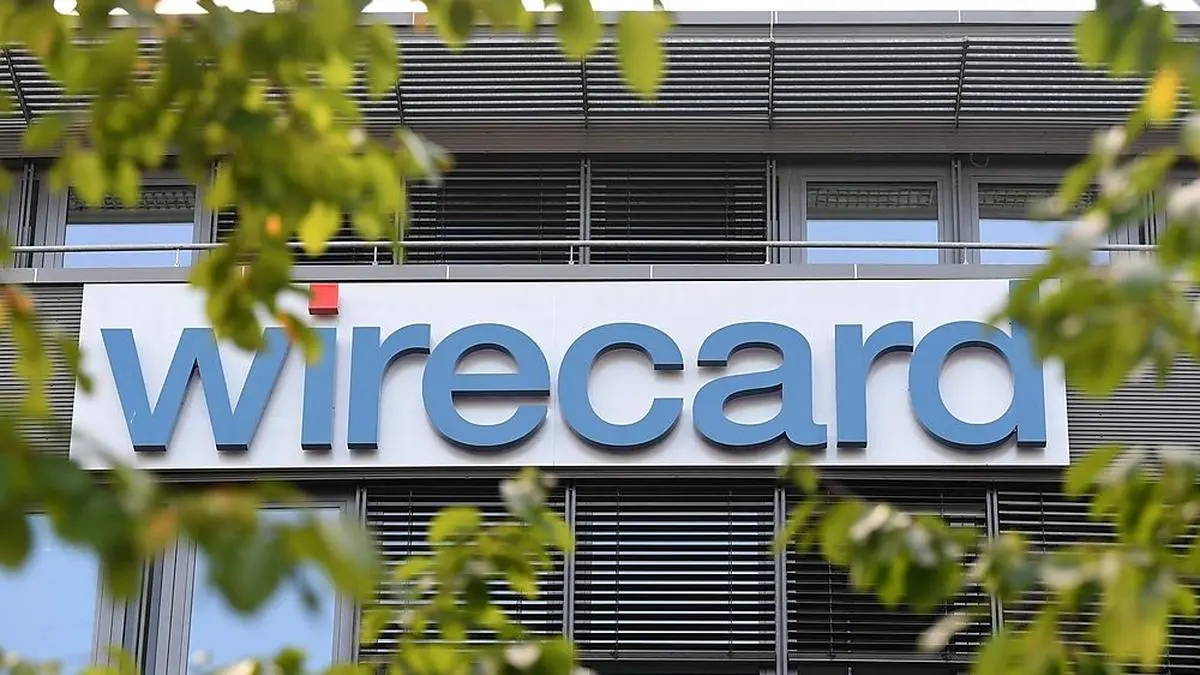 (FILES) In this file photo taken on September 18, 2018 Picture taken on September 18, 2018 shows the company logo at the headquarters of German payment processing firm Wirecard in Aschheim near Munich, southern Germany. - Shares in German payment processing firm Wirecard plunged for the second time in a week on February 1, 2019, after a newspaper report reinforced allegations of fraud in its Asian operations. (Photo by Christof STACHE / AFP)