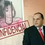 (FILES) This file photo taken on July 24, 2008 shows .Former Policia Judiciaria (Crime Police) detective Goncalo Amaral posing near a poster with his book entitled "Maddie:The Truth about the Lie" about the disappearance of British girl Madeleine McCann during its presentation in Lisbon July 24, 2008. .Portugal's supreme court on January 31, 2017 upheld the acquittal of an Goncalo Amaral sued for libel by the parents of Madeleine McCann, the British toddler who disappeared during a family vacation in 2007. / AFP PHOTO / JOAO CORTESAO