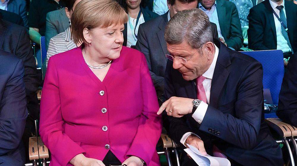 Bernhard Mattes mit Angela Merkel auf der IAA