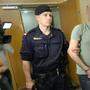 Einer der neun angeklagten Iraker zu Prozessbeginn 