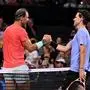 Winner Rafael Nadal of Spain (L) shakes hands with Austria's Dominic Thiem after their men's singles match at the Brisbane International tennis tournament in Brisbane on January 2, 2024. (Photo by William WEST / AFP) / --IMAGE RESTRICTED TO EDITORIAL USE - STRICTLY NO COMMERCIAL USE--