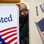 Longview, Wash., resident Cornell Anderson fills out his ballot at the Cowlitz County Administration Building in Kelso, Wash., on Election Day, Tuesday, Nov. 3, 2020. (Courtney Talak/The Daily News via AP)