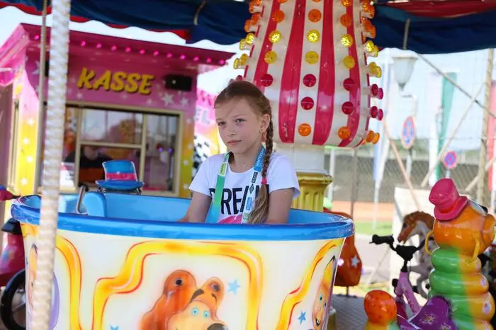 Einige Kinder drehten auch eine Runde auf dem Karussell