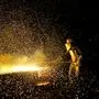 Industrial welder worker in steel plant