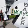 (FILES) In this file photo taken on May 25, 2018, a protester wears a pill shaped costume bearing the names of Bayer and Monsanto during a demonstration against the takeover of US seeds and pesticides maker Monsanto by German chemicals firm Bayer outside the World Conference Center in Bonn, western Germany, where the annual General meeting of chemicals giant Bayer was taking place. - Monsanto was ordered on March 27, 2019 to pay some $81 million to an American retiree who blames his cancer on the agribusiness giant's weedkiller Roundup. A San Francisco jury found the firm had been "negligent by not using reasonable care" to warn of the risks of its product, ordering it to pay Edwin Hardeman $75 million in punitive damages, $5.6 million in compensation and $200,000 for medical expenses. The same jury previously found that a quarter century exposure to Roundup, whose principal ingredient is controversial chemical glyphosate, was a "substantial factor" in giving the 70-year-old Hardeman non-Hodgkin's lymphoma. (Photo by Patrik STOLLARZ / AFP)