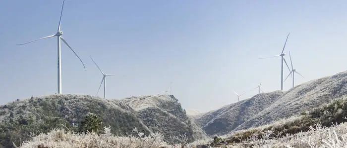 Windmills on snowy mountains PUBLICATIONxNOTxINxCHN 634113154942107971