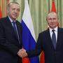 Erdoan und Putin begrüßten sich mit einem freundschaftlichen Händedruck 