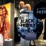 This photograph shows an advertising for Black Friday sale in a shopping street in downtown Amsterdam on November 24, 2024. (Photo by Ramon van Flymen / various sources / AFP) / Netherlands OUT