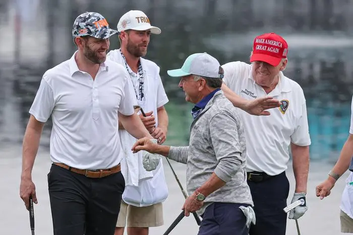 Golf: LIV Golf Bedminster - ProAm Round Aug 10, 2023 Bedminster, New Jersey, USA Eric J. Trump left and Former President Donald Trump right and Dustin Johnson celebrate with Steve Witkoff center on the 18th green during the ProAm round of the LIV Golf Bedminster golf tournament at Trump National Bedminster. Bedminster Trump National Bedminster New Jersey USA, EDITORIAL USE ONLY PUBLICATIONxINxGERxSUIxAUTxONLY Copyright: xVincentxCarchiettax 20230810_jcd_cb6_0117