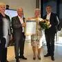Stadträtin Doris Degenkolb, Bürgermeister Josef Ober, Obfrau Antonia Nitsch und Landtagsabgeordneter Franz Fartek bei der Überreichung der Verdiensturkunde