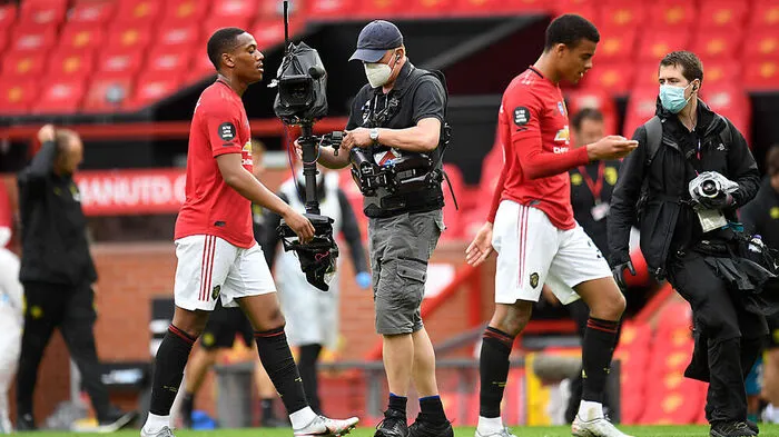 Manchester United, ManU v AFC Bournemouth - Premier League - Old Trafford TV camera operator wearing a face mask follow