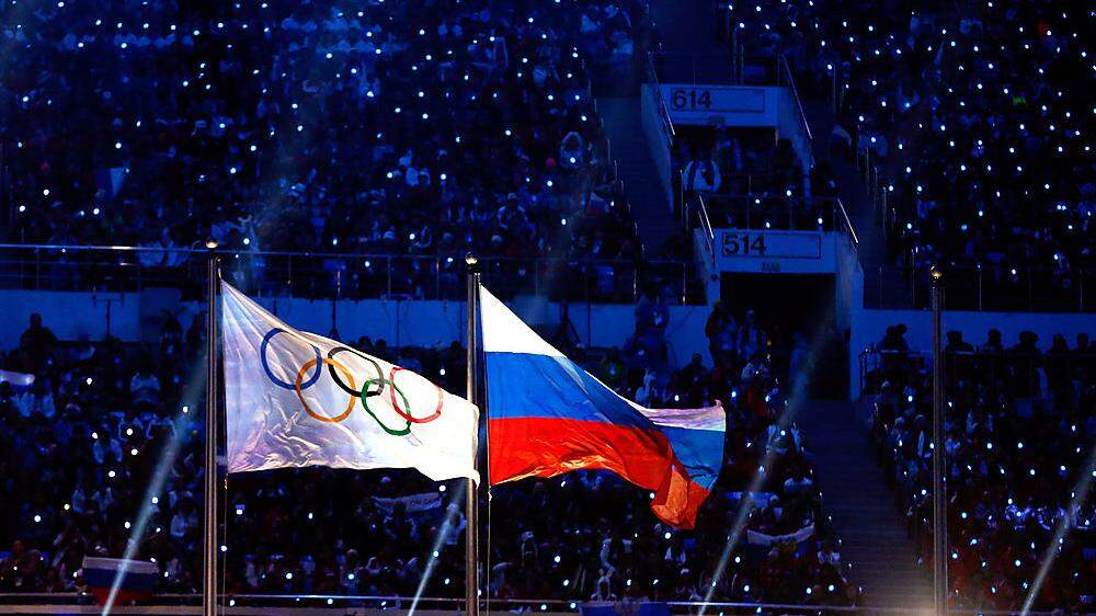Die olympische und die russische Fahne nebeneinander: Ein Bild, was man so innerhalb der nächsten zwei Jahre nicht zu sehen bekommen wird.