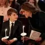 Britain's Kate, Princess of Wales, right, Princess Charlotte, left, and Prince Louis attend the "Together At Christmas" carol service at Westminster Abbey, in London, Friday, Dec. 5, 2025. (Aaron Chown/Pool Photo via AP)