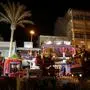 Ambulance and firefighters vehicles are seen after a two-storey building collapsed in restaurants area, killing at least two and injuring around 12 people on Playa de Palma, south of the Spanish Mediterranean island's capital Palma de Mallorca, on May 23, 2024. At least two people died and around 12 were injured after the roof of a two-storey building collapsed on Spain's Mediterranean island of Mallorca on May 23, 2024, AFP reported. (Photo by Jaime REINA / AFP)