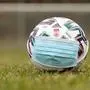 EGGERSDORF,AUSTRIA,04.APR.20 - SOCCER - tipico Bundesliga, photoshooting due to the SARS-CoV-2 crisis, corona crisis. Image shows the official league ball and a face mask.
Photo: GEPA pictures/ Christian Walgram