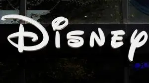 FILE - The Disney logo is seen on their store along the Champs Elysees Avenue in Paris on Sept. 20, 2017. (AP Photo/Francois Mori, File)